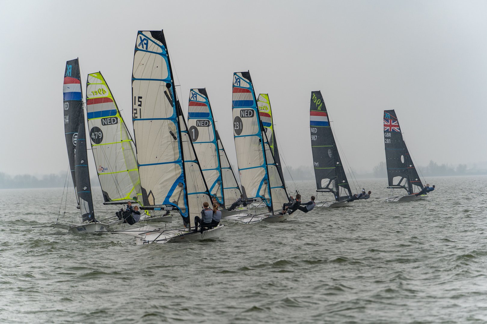 Medemblik, Netherlands – April 22, 2023: The Olympic sailboats on the sea. Medemblik, the Netherlands.