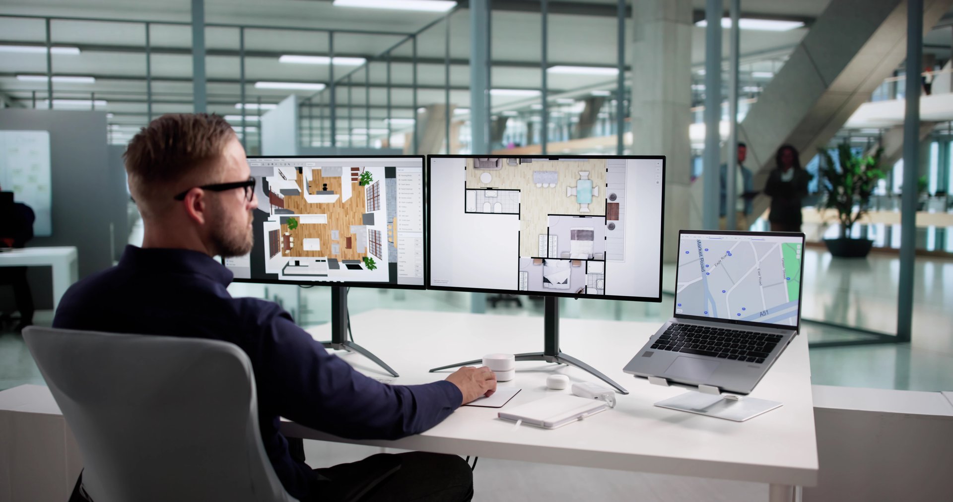 Young real estate agent Using 3D CAD Model