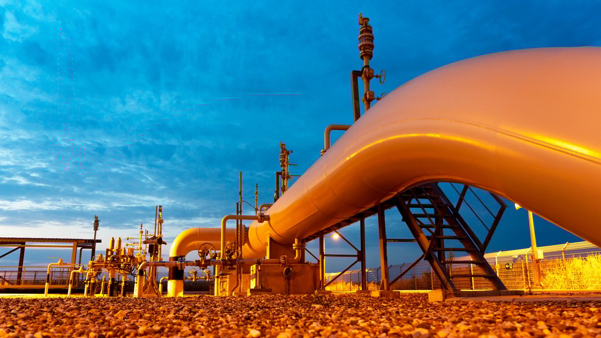View of the natural gas pipeline exiting the ground to the receiving and starting chamber of the cleaning device, piston, pig.