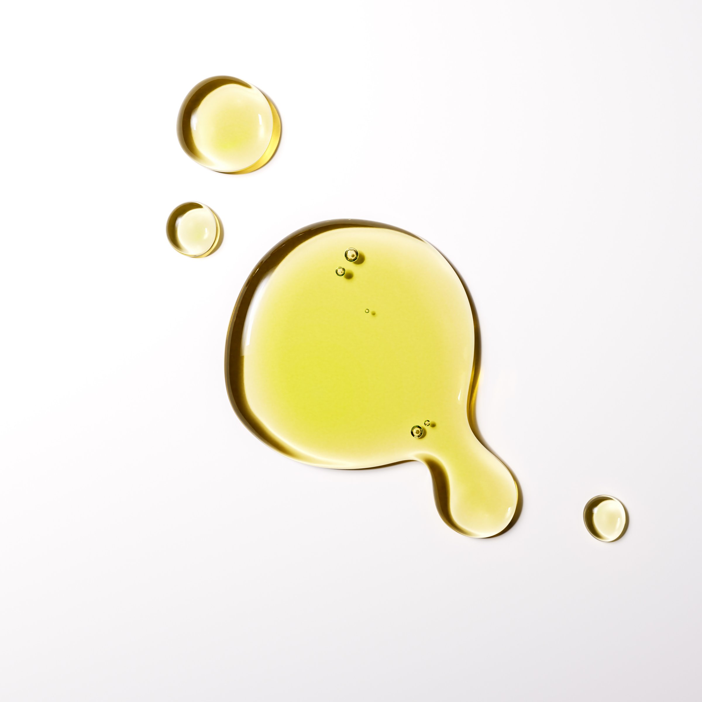 Avocado oil droplets, yellow liquid serum texture, 3d rendering facial oil drops skin care beauty product