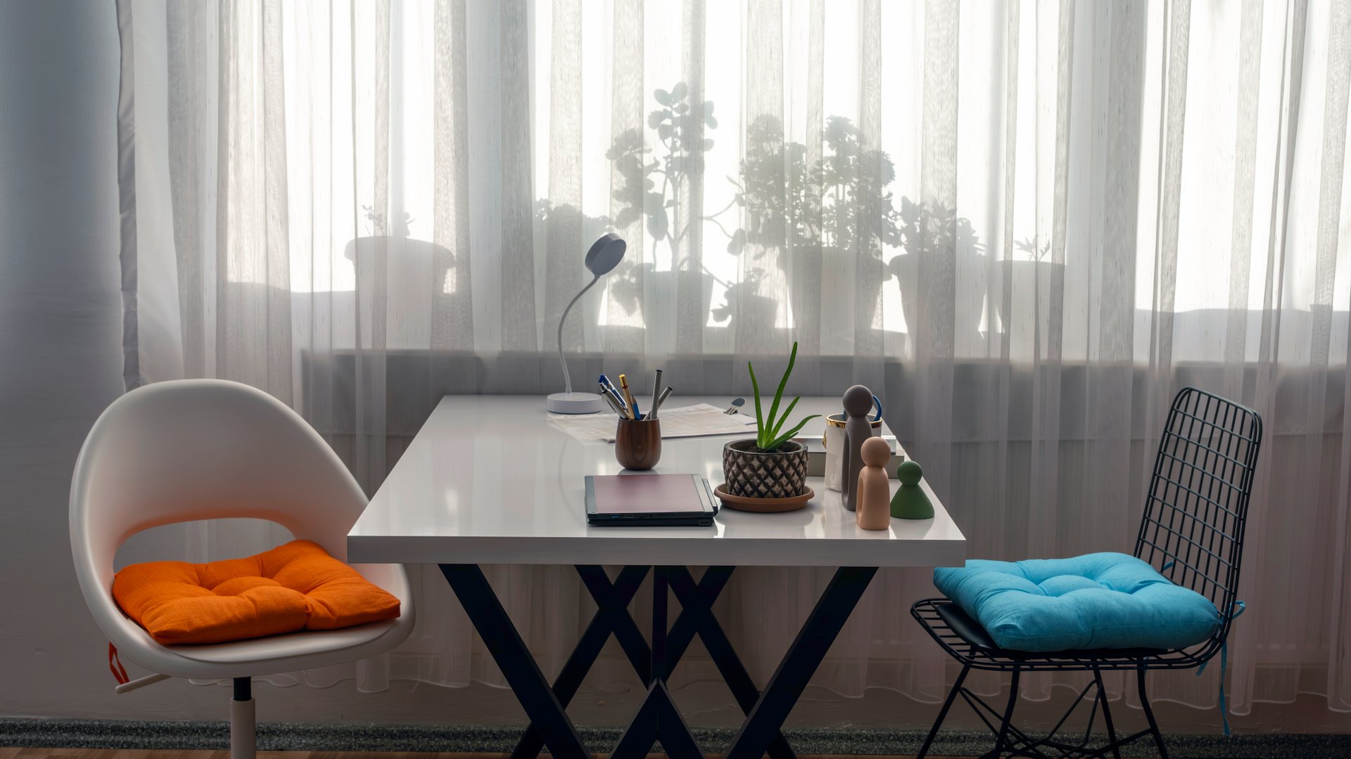 work desk, white desk, businessman's rotating chair, office desk and office chair, laptop, book, pen, ornaments, modern decor, window sill flower silhouettes