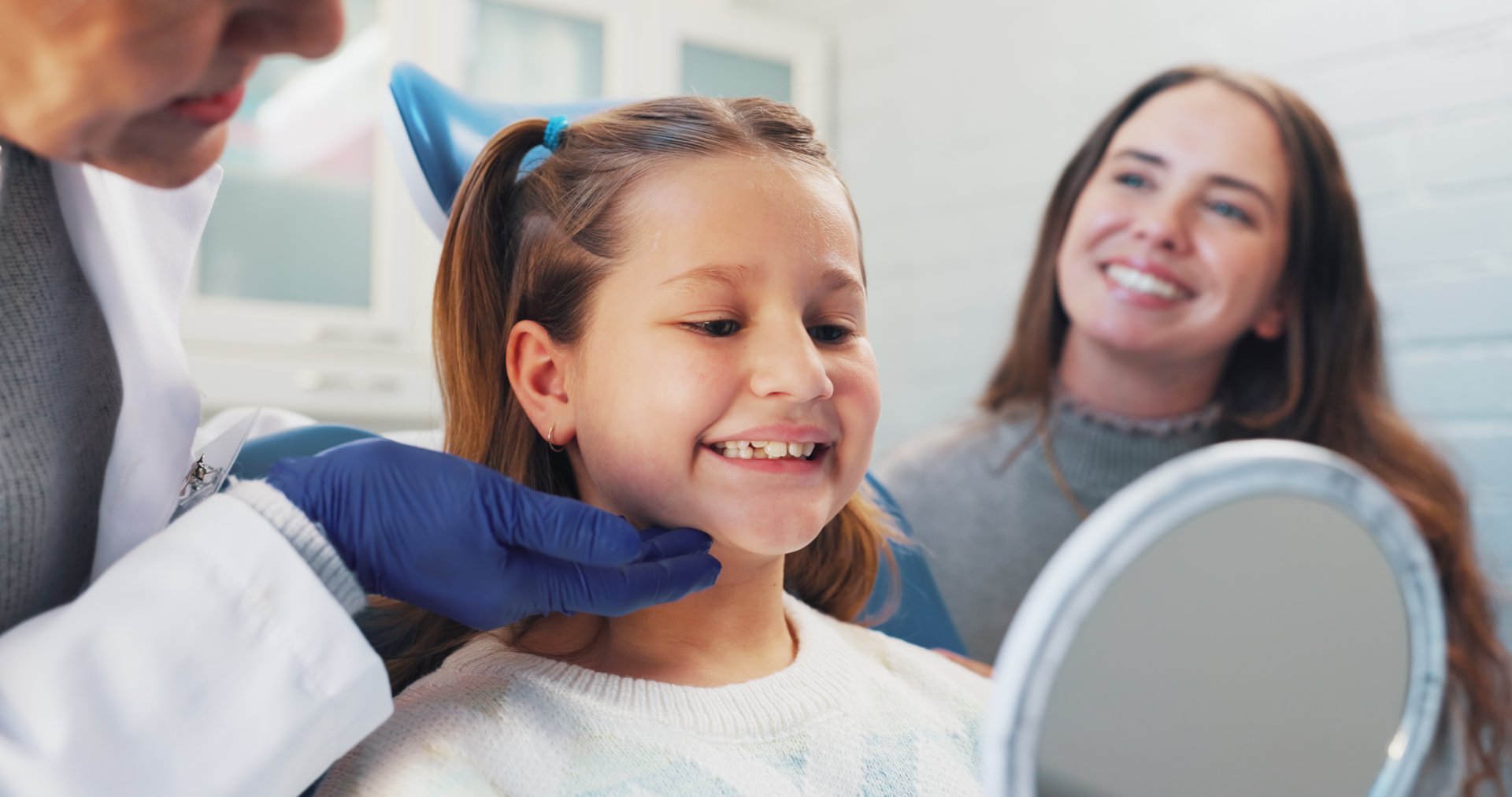 Happy child at dentist clinic for oral hygiene