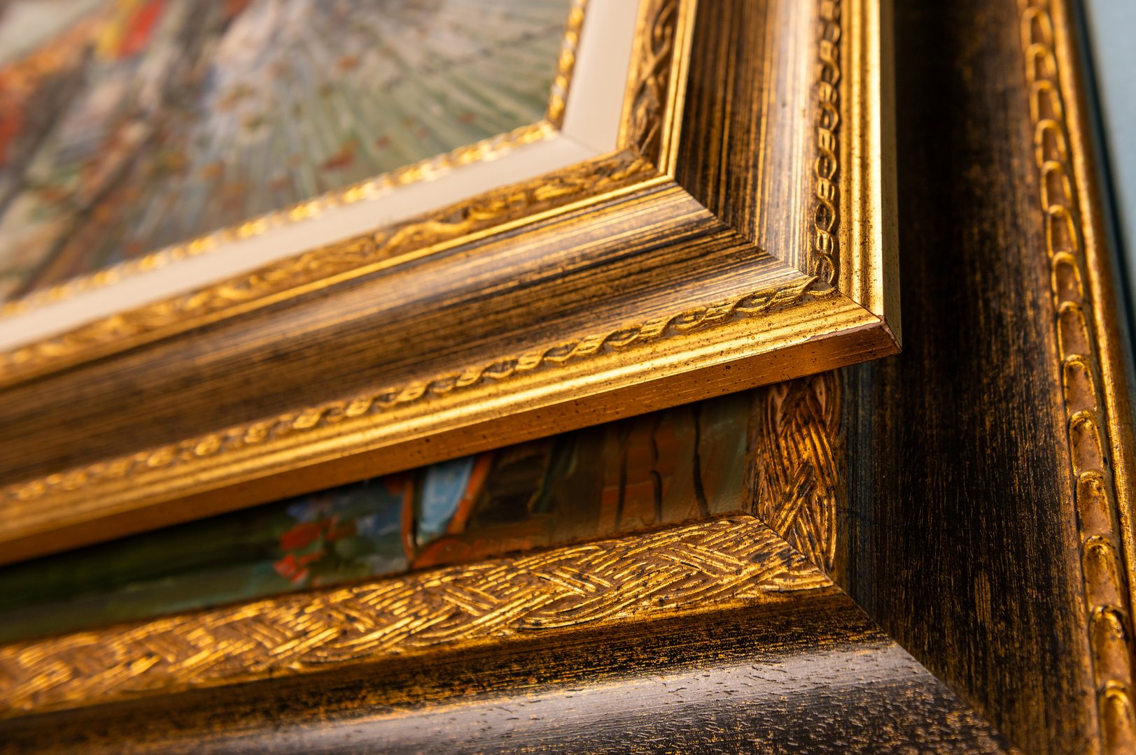 Antique wooden picture frames. Old rustic wooden frames close-up. Antique carved gilded frame. Selected focus