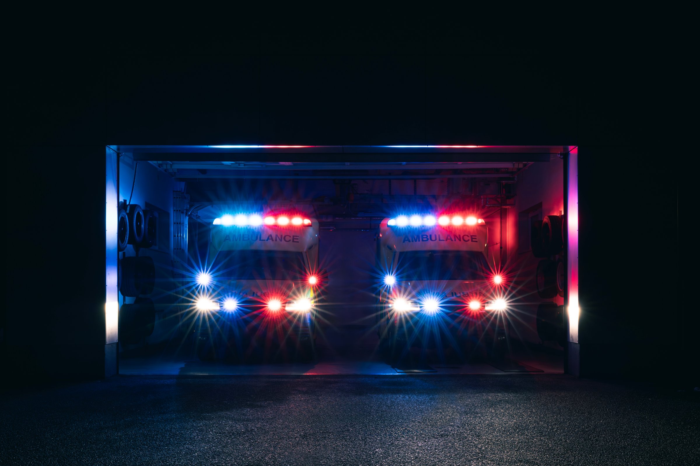 Station of emergency medical service. Two ambulance cars ready to response. Themes emergency medicine, rescue, and emergency.