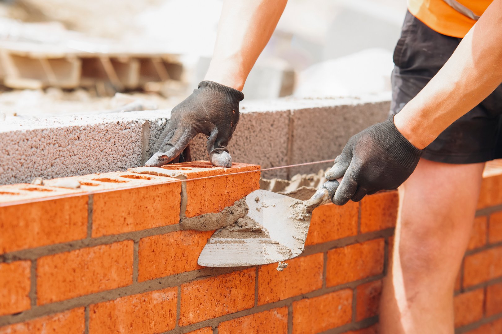 UK house building site with brick and mortar construction