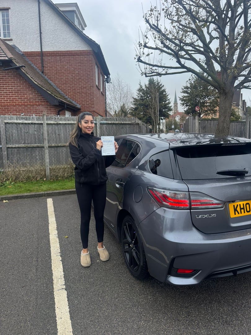 Successful driving test student with pass certificate