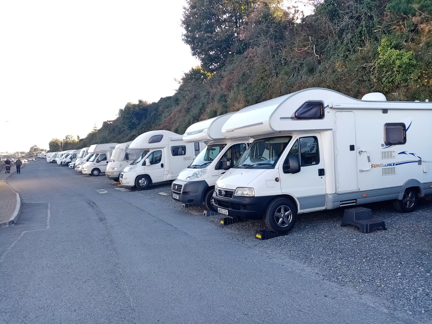 10th October 2024, Carlingford, County Louth, Ireland. Camper vans parked next to the harbour or marina.