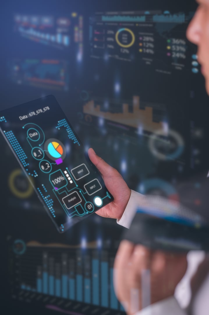 Businessman holding digital tablet checking diagram or data chart technology and science in concept of data analysis. Data scientist querying, analysing and visualizing complex set on virtual screen