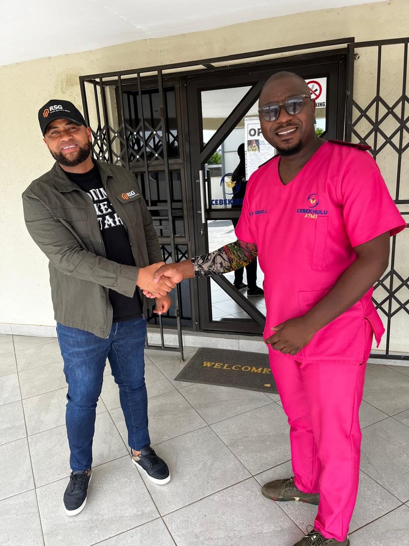 CEO Kabelo Letsoalo with Cebekhulu Clinic representative at launch event