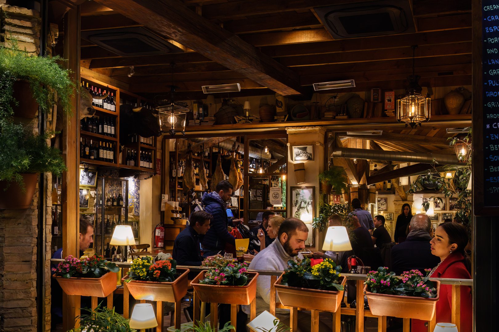 Seville, Spain. February 4, 2024 - Evening dinner at a traditional restaurant