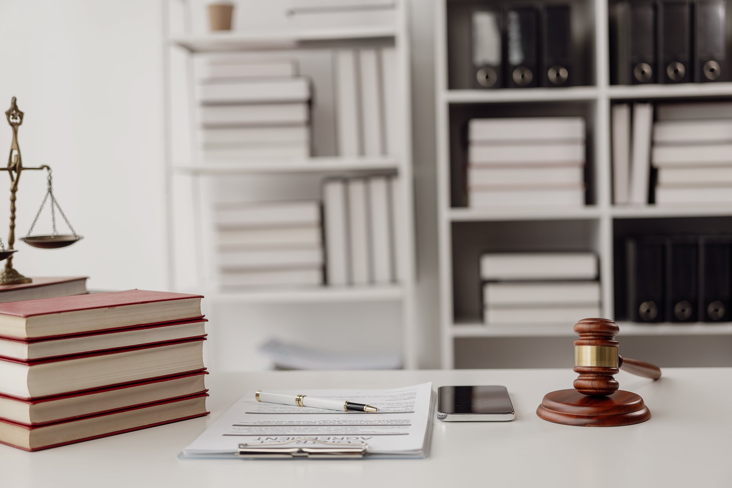 Judge's hammer based on evidence and documents taken into consideration Legal scales and judge's hammer, scales of justice copy space judicial legal concept