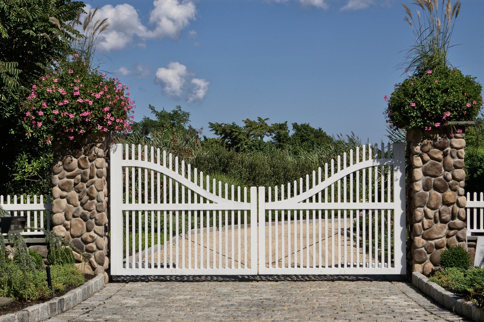A fancy gate in front of a house.