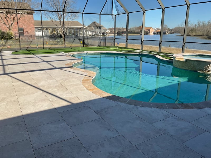 Pool construction expert inspecting in-ground swimming pool build in Louisiana