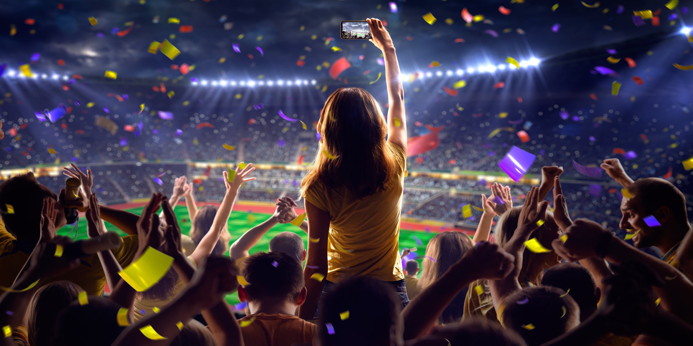 Fans on stadium soccer game Confetti and tinsel