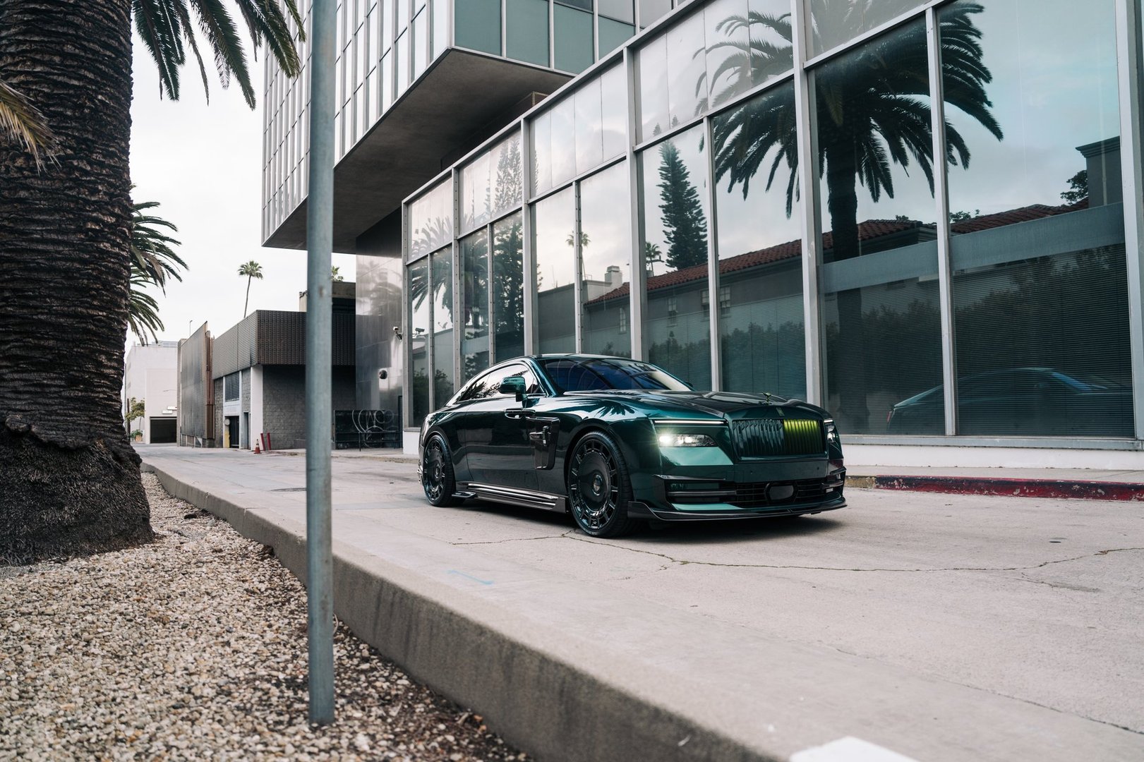 Miami, FL, USA June 2, 2025 Rolls Royce Spectre Mansory parked showing the front of the car