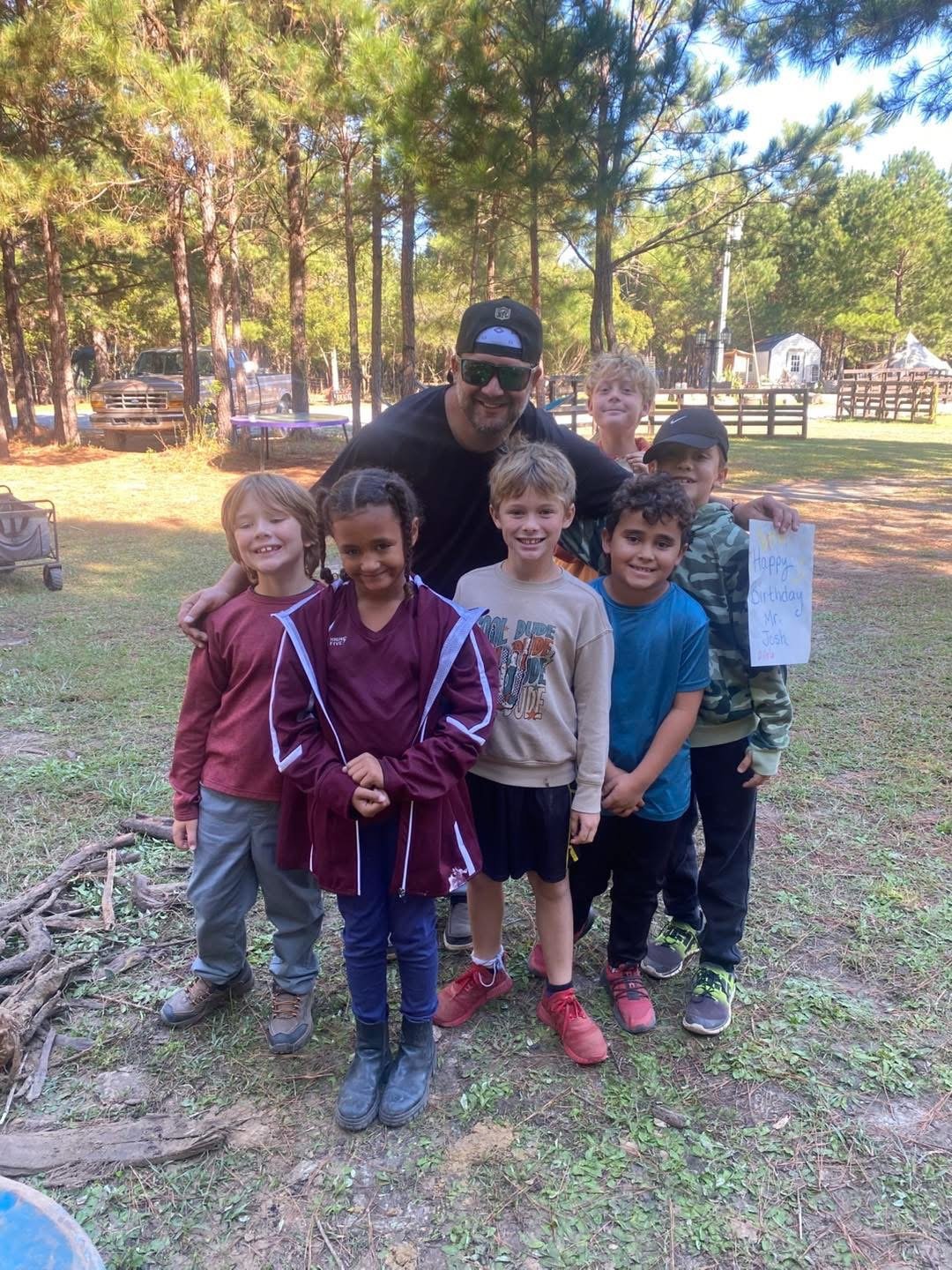 Marie Hall with students at Mindful Journey Academy