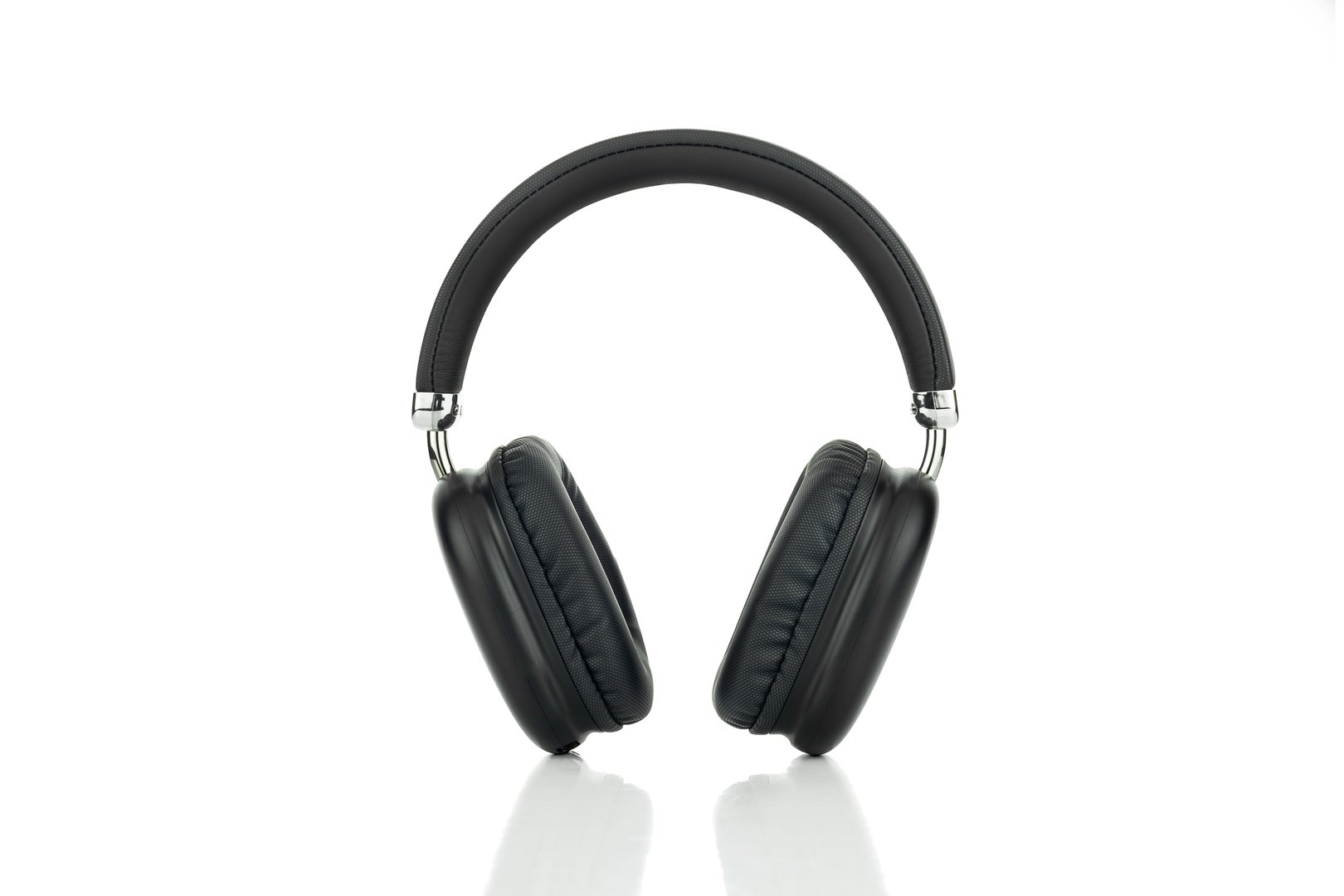 Black wireless headphones isolated on a white background with clipping path.