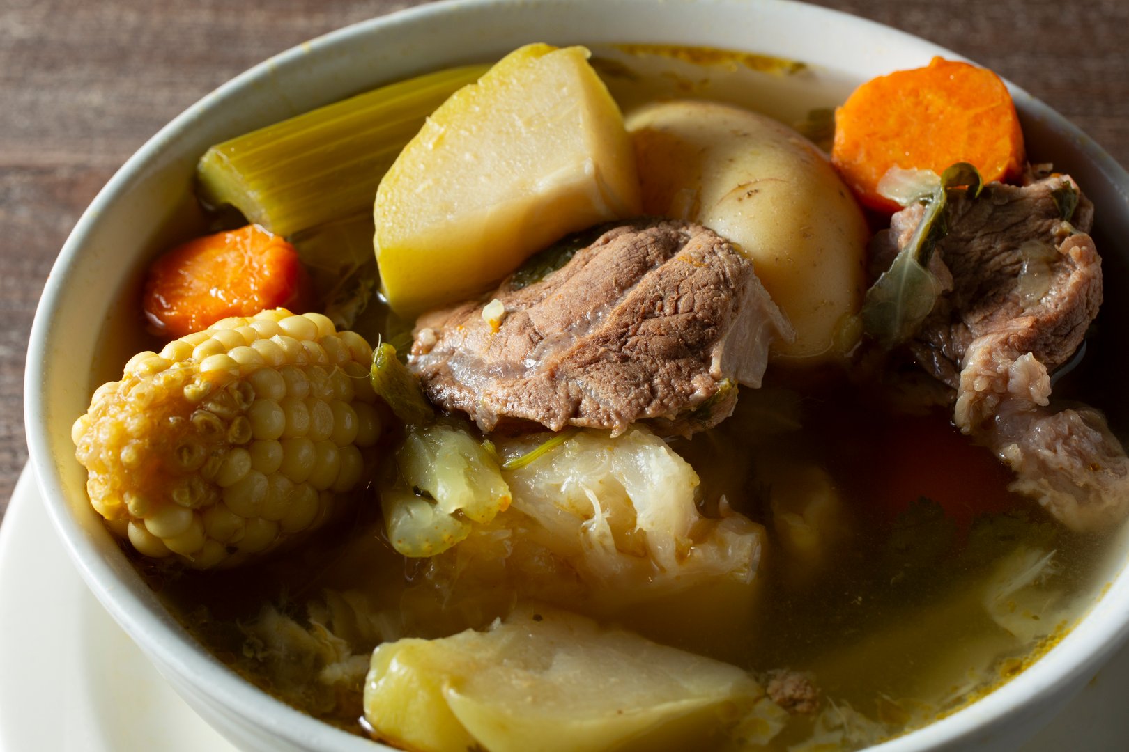 A closeup view of a bowl of caldo de res.