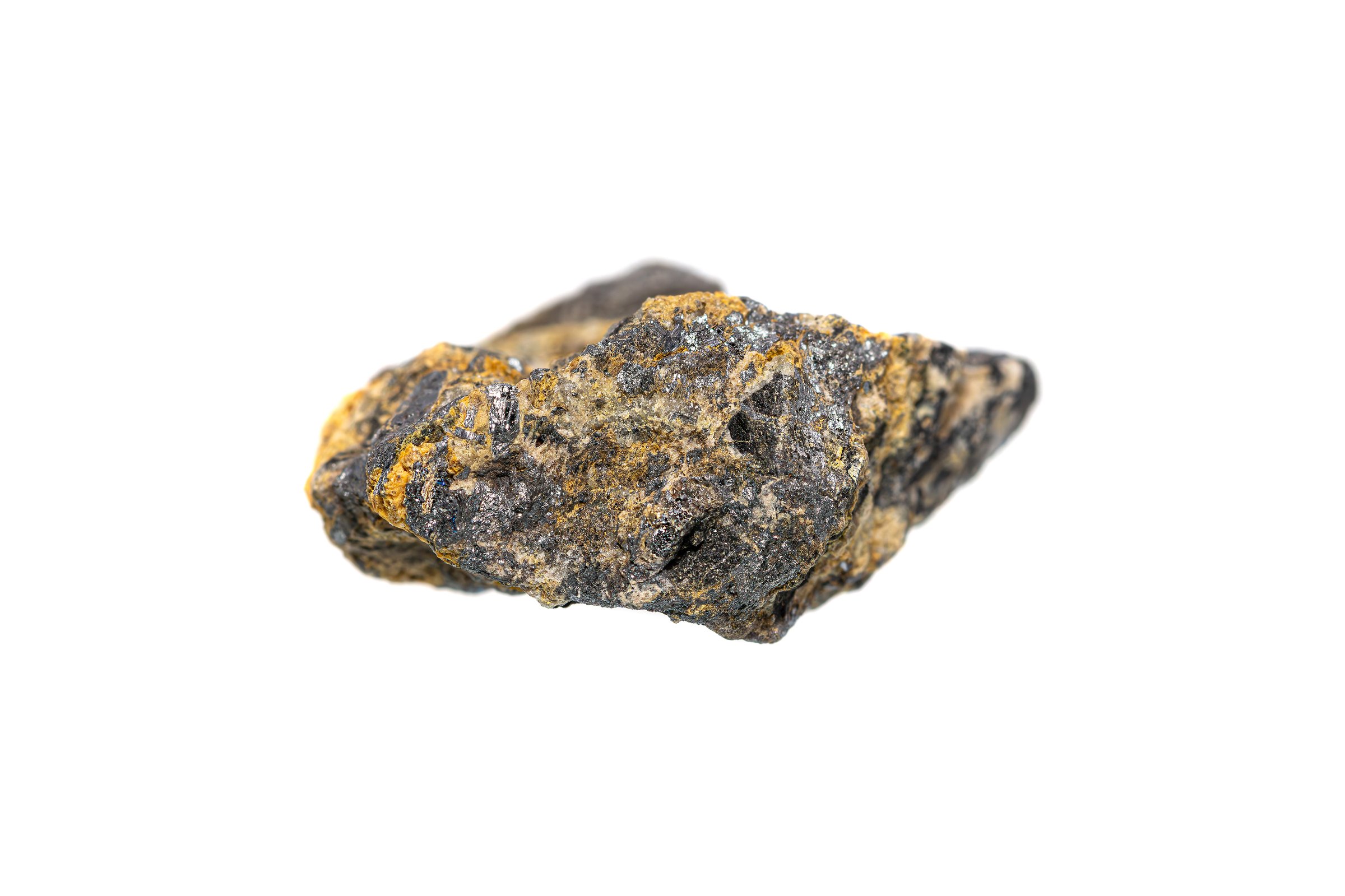 Natural raw Antimony ore on white background (selective focus)