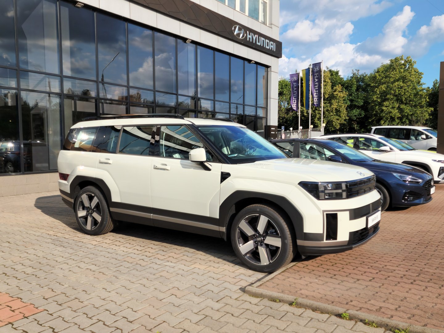 Kyiv, Ukraine - June 24 2025: new model of Hyundai Santa Fe is displayed in front of a dealership store