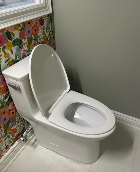 Plumber working on pipes