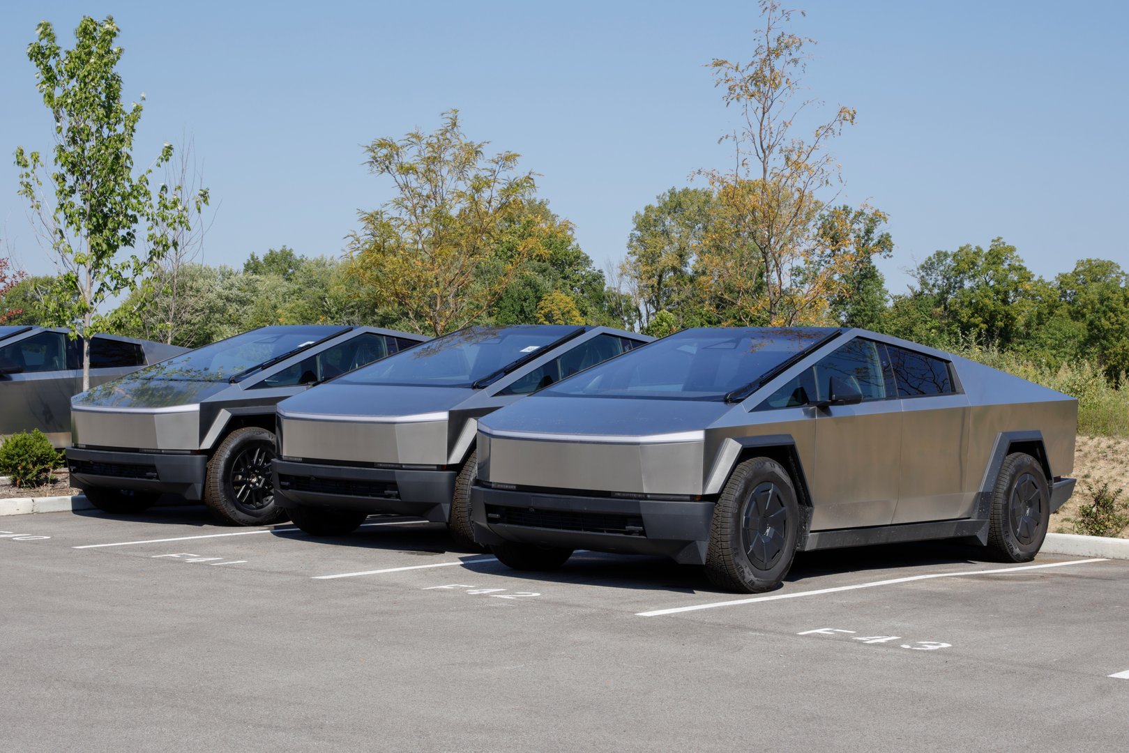 Indianapolis - September 14, 2025: Tesla Cybertruck unsold inventory at a dealership. Tesla offers the Cybertruck with driving range of up to 334 miles. MY:2025