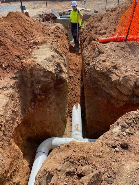 Commercial underground PVC plumbing installation Adelaide