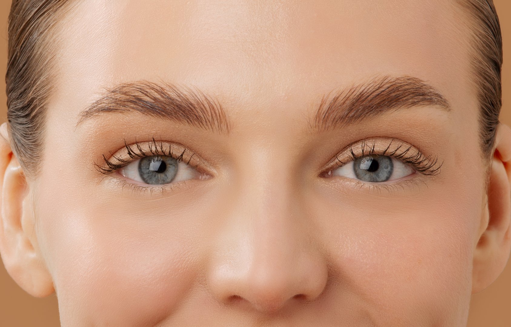 Closeup shot of beautiful woman with nude make-up and beautiful eyes, cosmetology, skin care concept