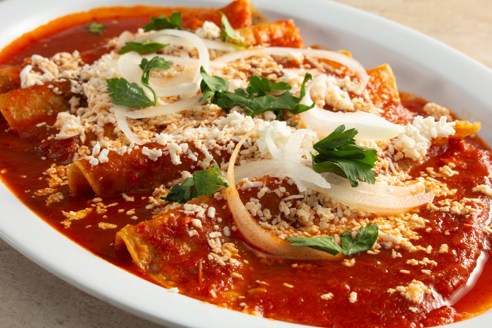 A view of a plate of entomatadas.