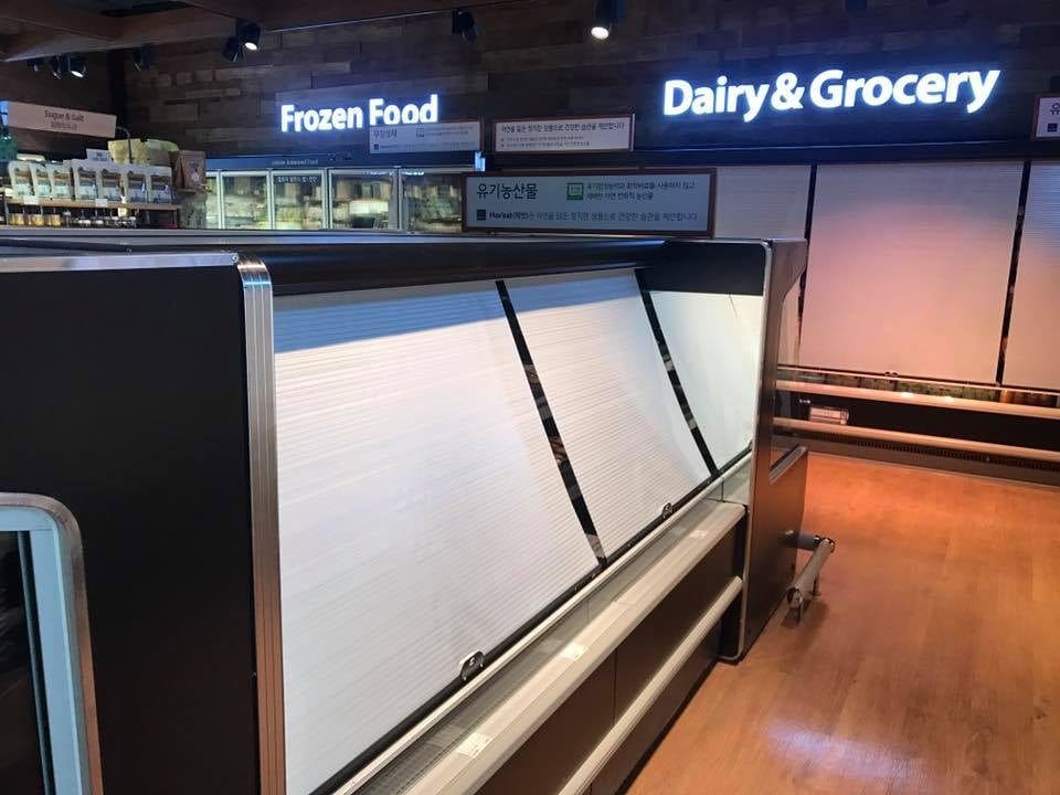 Night Covers installed on refrigerated case