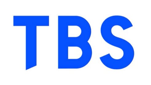 Blue "TBS" logo on a white background with bold, uppercase letters.