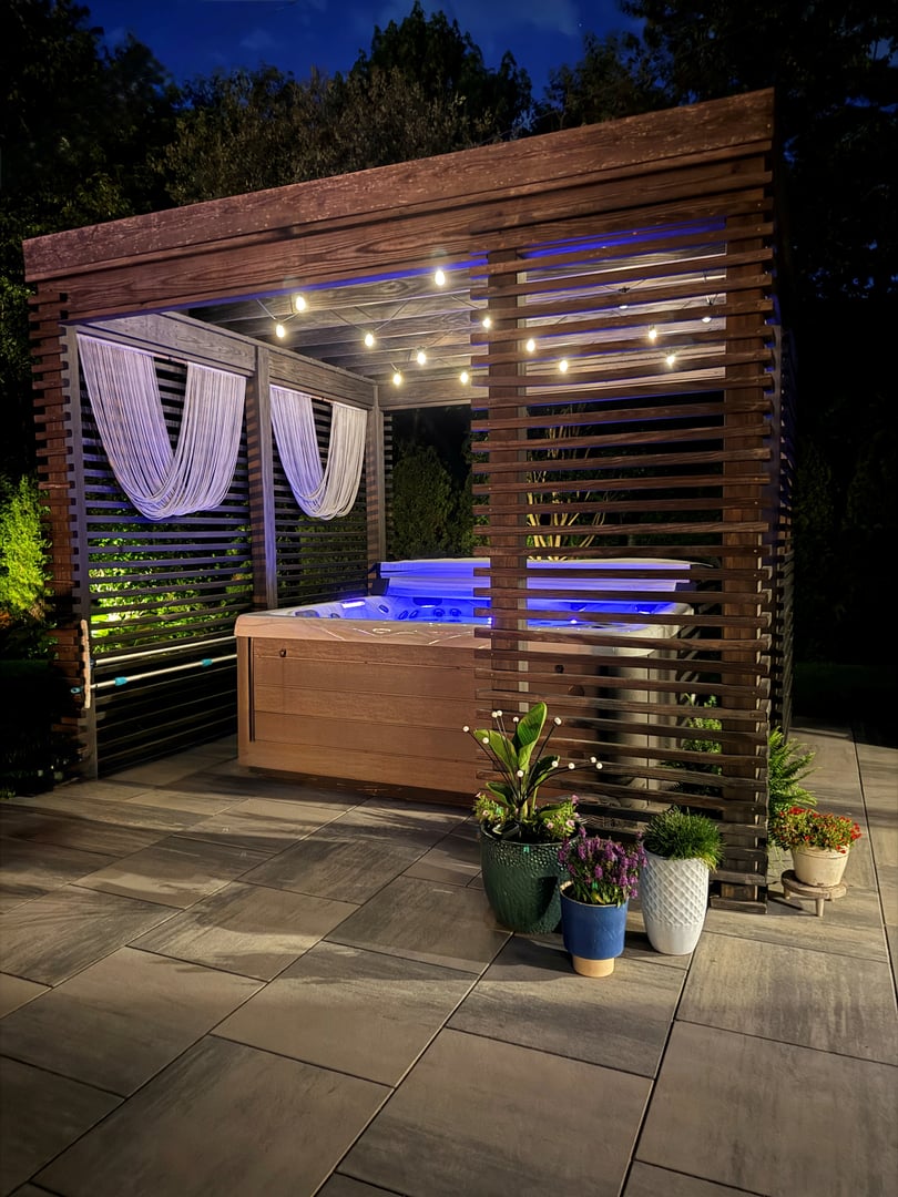 Inside sits a hot tub spa with seats, lounger.  Spa like feel.  Artsy decor and plants set the mood with colored LED lights.  Open and airy - use all year round.  Great for all seasons, winter, spring summer and fall.