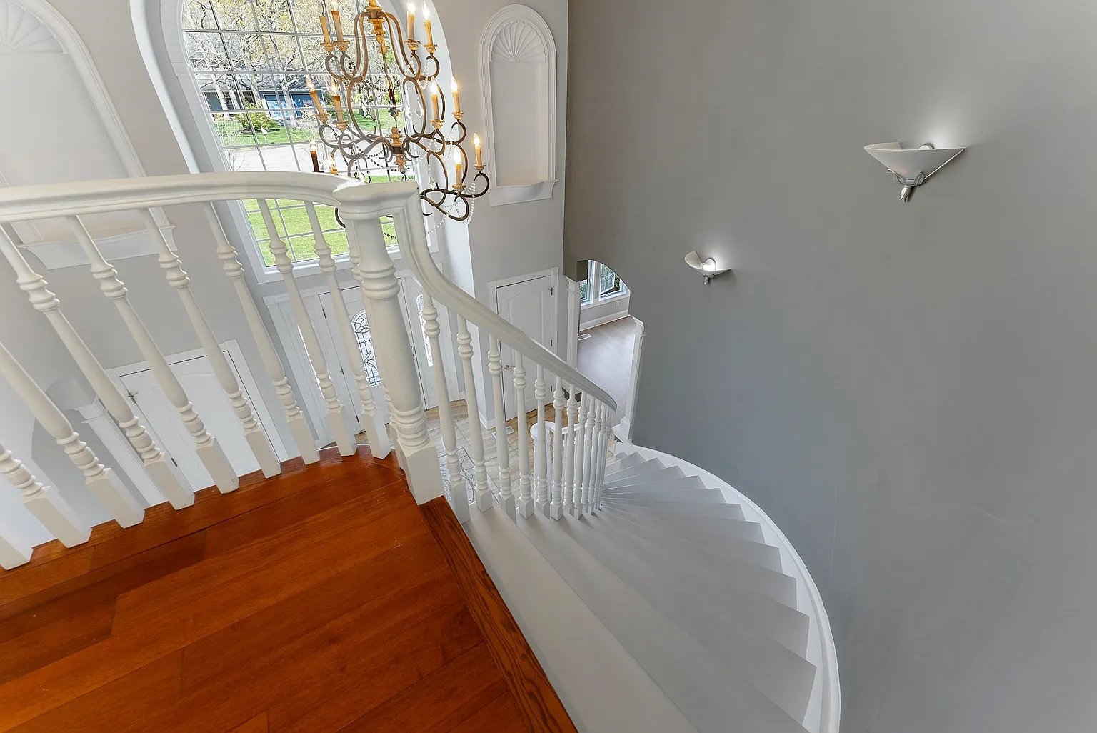 Elegant staircase transformation showcasing premium interior painting and design craftsmanship