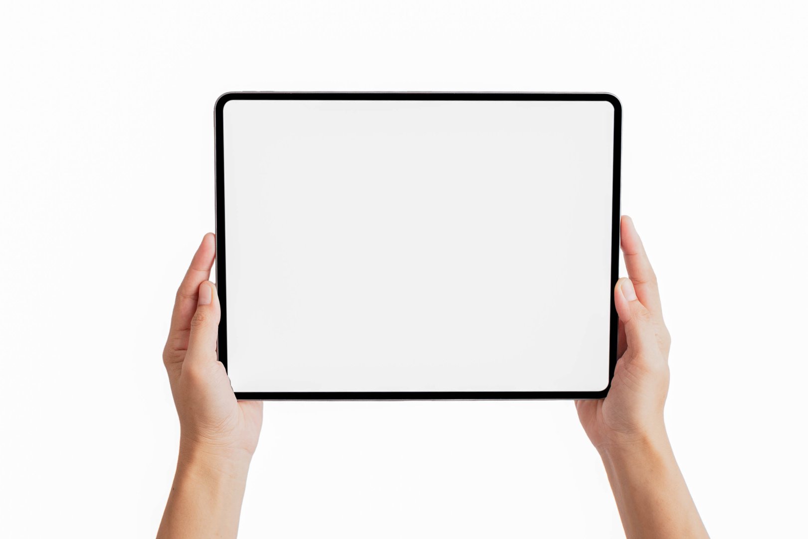 Female hand holding a tablet showing on a white background
