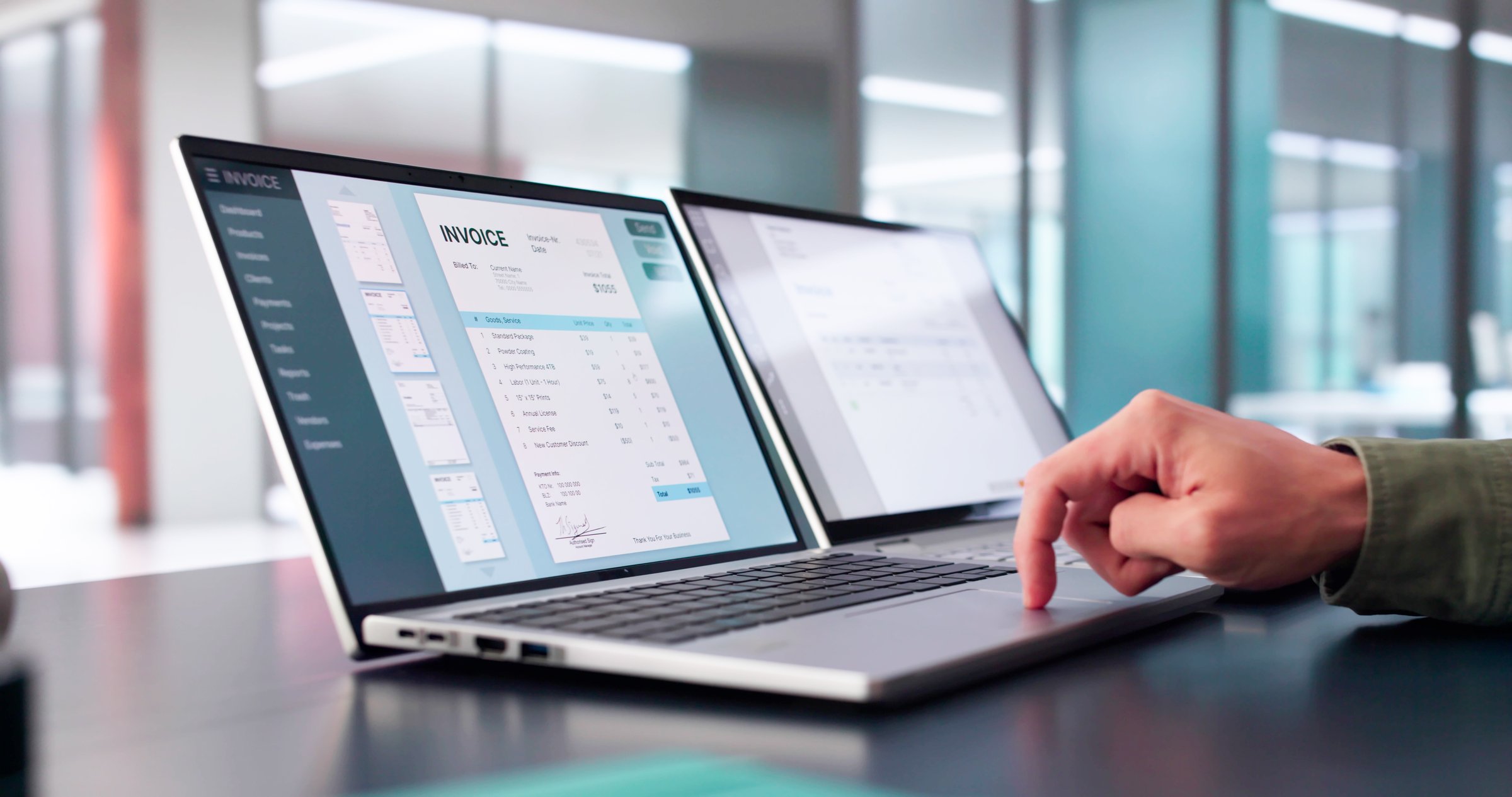 Accountant Calculating Electronic Invoice Or E Bill At Desk