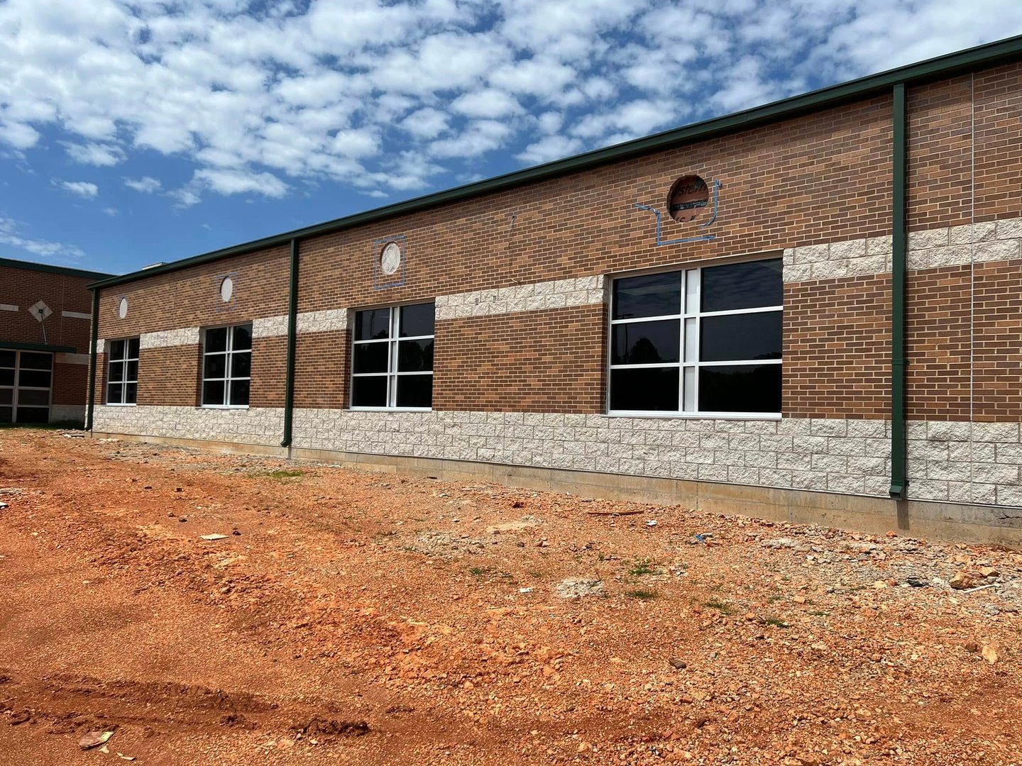 Clear anodized storefront for new construction school building