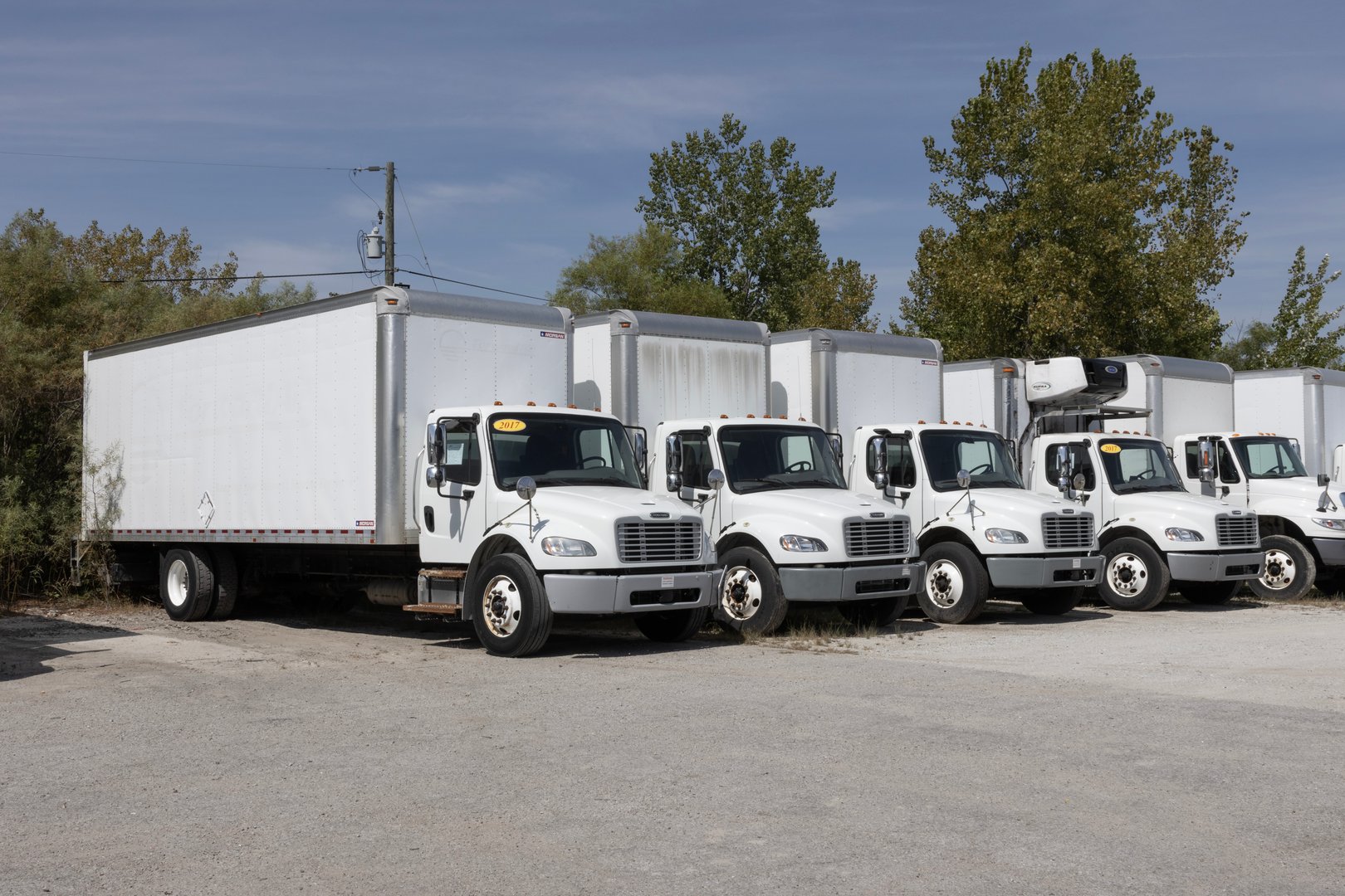 Indianapolis - September 12, 2024: Used Freightliner big rig trucks for sale. With pricing concerns, Freightliner is selling preowned semi trucks to meet demand.