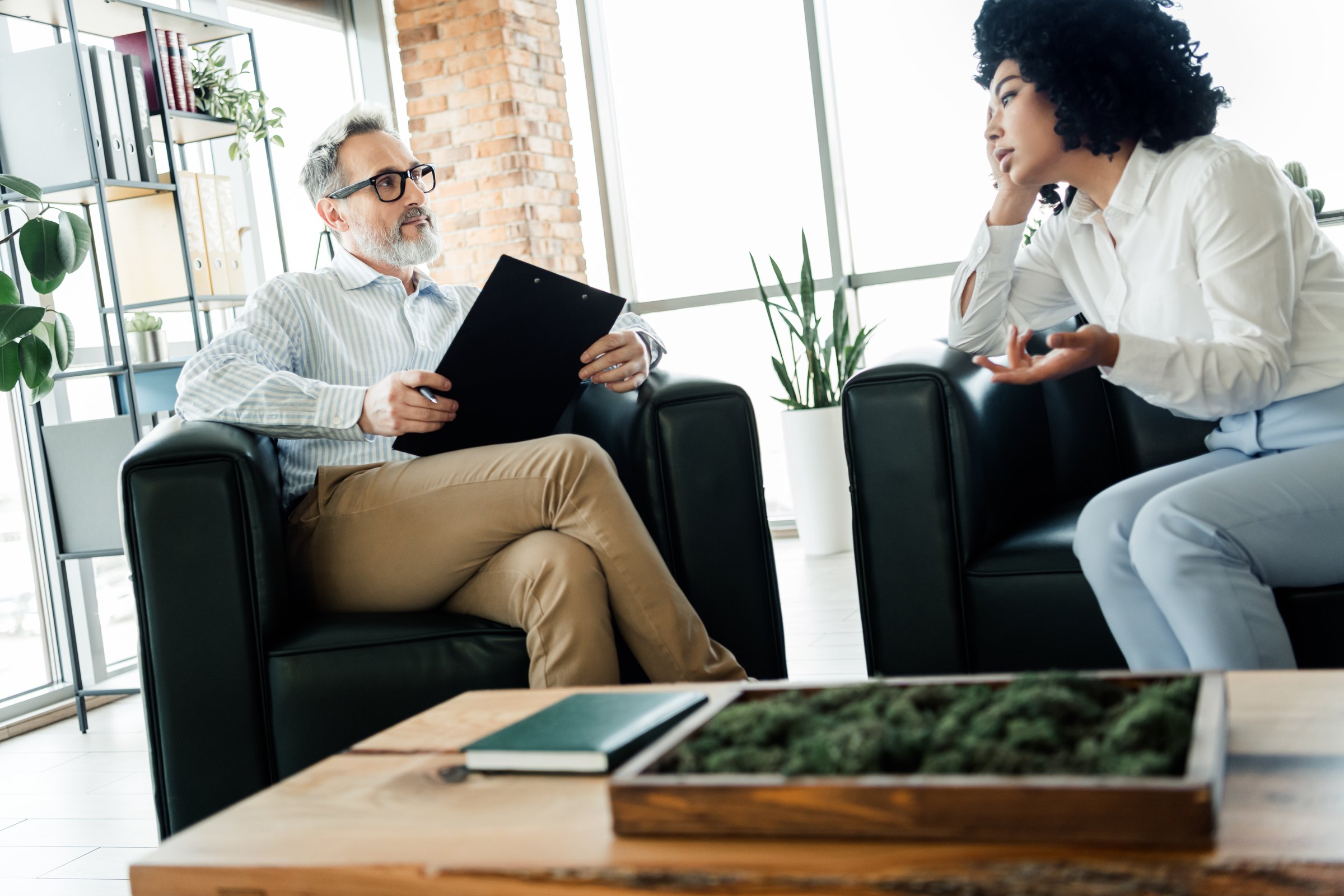 Business professionals in meeting