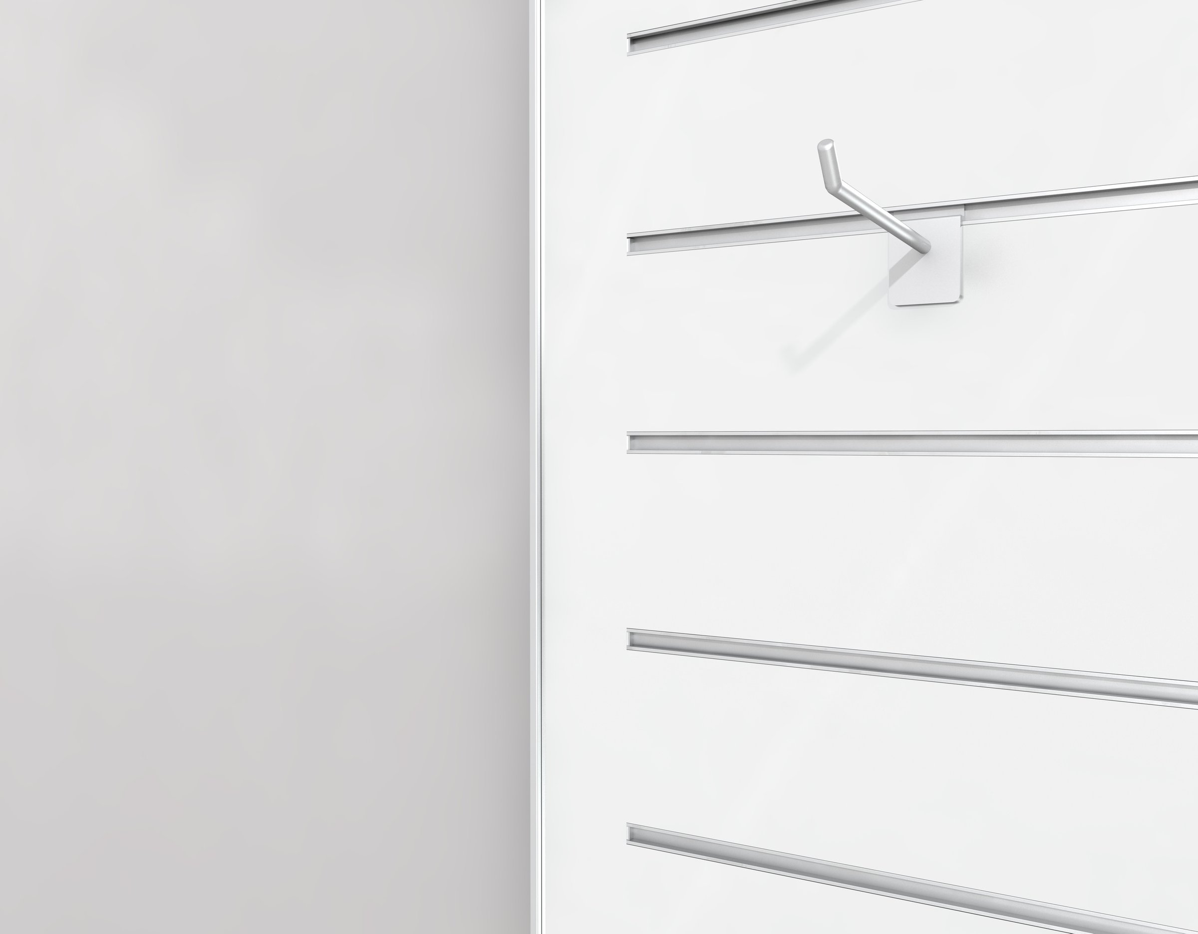 close -up view of a shop slat-board with a single peg hanger