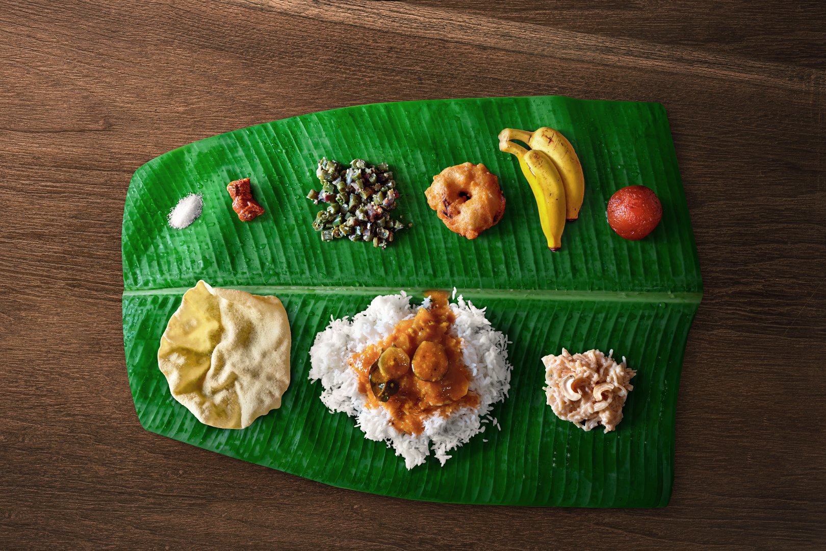 Traditional South Indian vegetarian rice dish served on a banana leaf