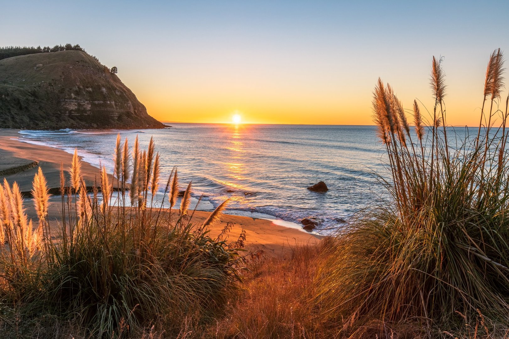 Sunrise on the east coast of New Zealand at Waipatiki beach