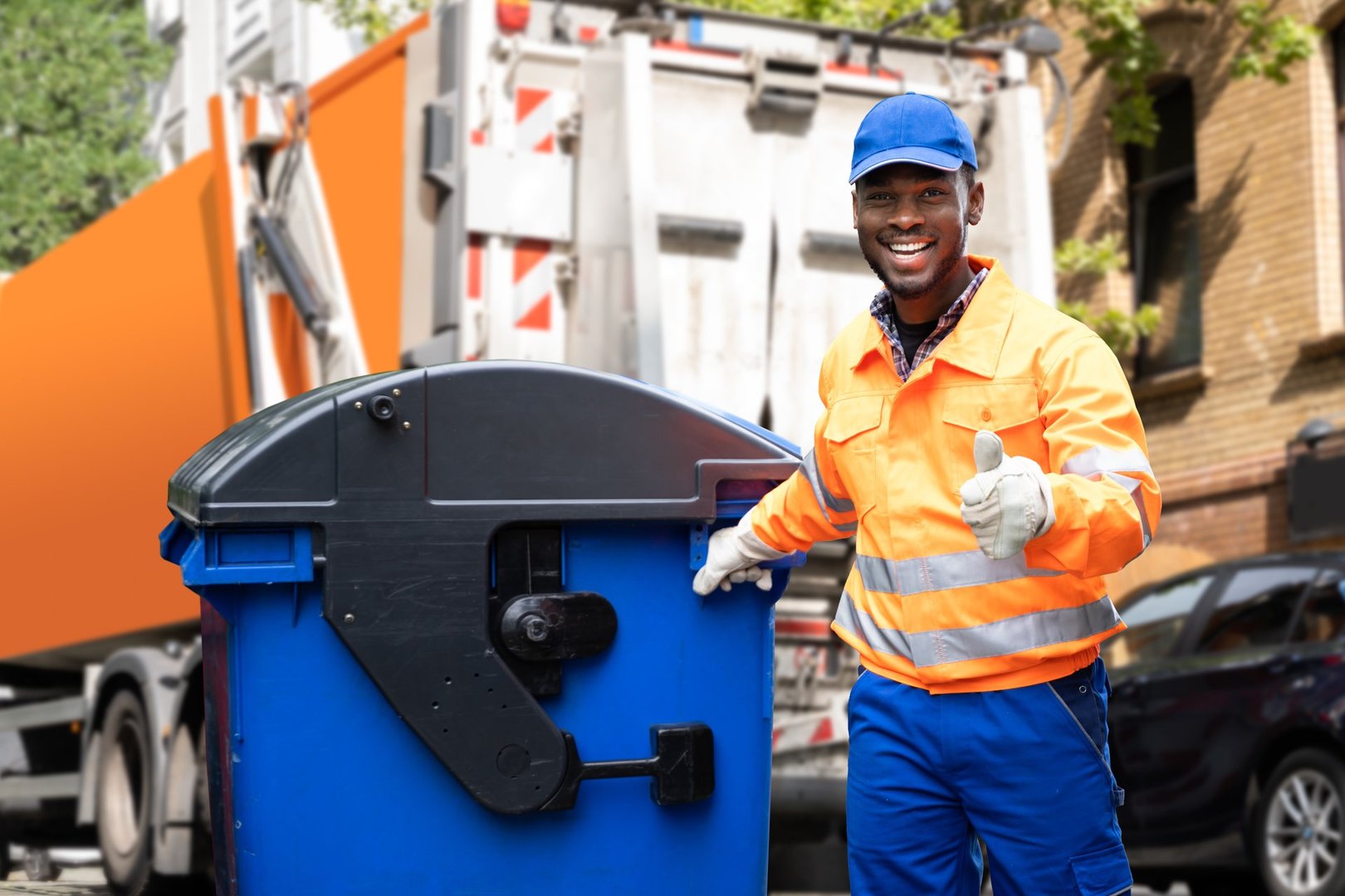 Garbage removal man doing trash collection - professional junk removal Lexington