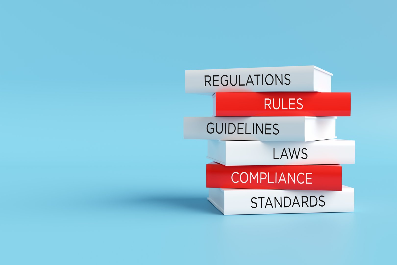 Books forming a stack with words regulations, rules, guidelines, laws, compliance and standards, compliance concept. 3D render.