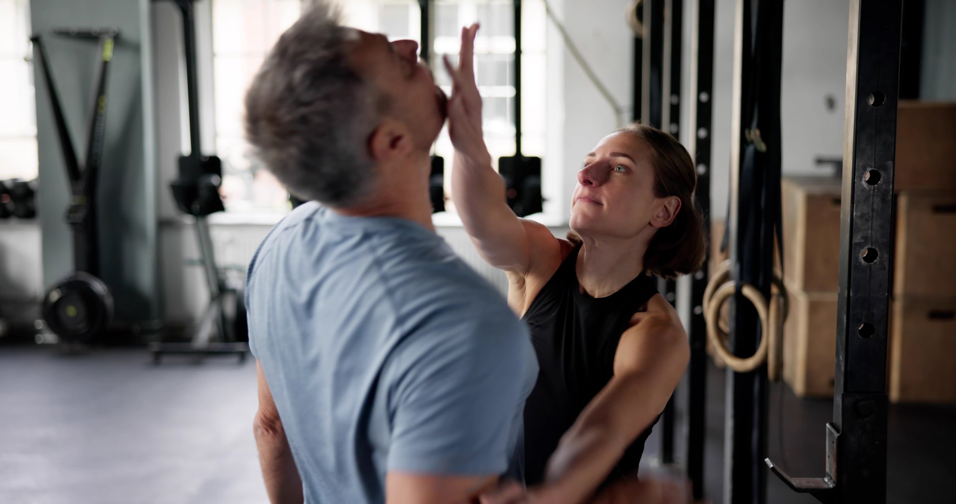 Self Defense Safety Class With Personal Trainer. Woman Learning Fight Techniques