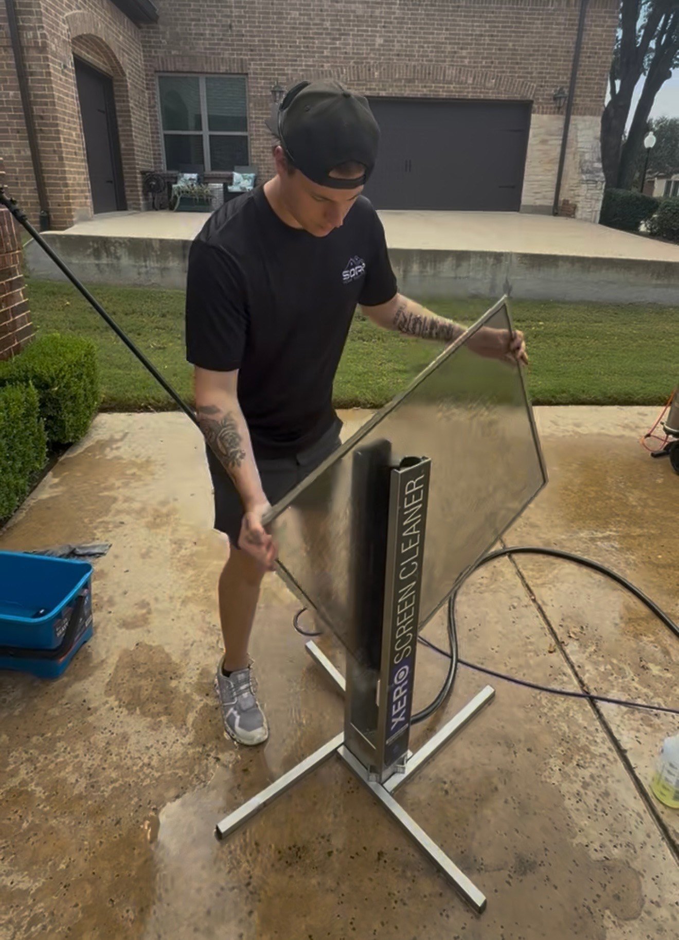 Soar Home Services professional carefully cleaning windows in Dallas-Fort Worth