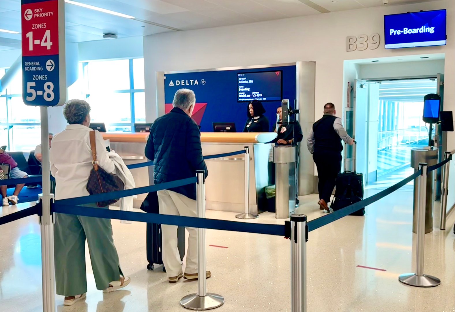 JFK International Airport, New York, New York,Passengers waiting to board their next Delta flight, to Atlanta, GA.