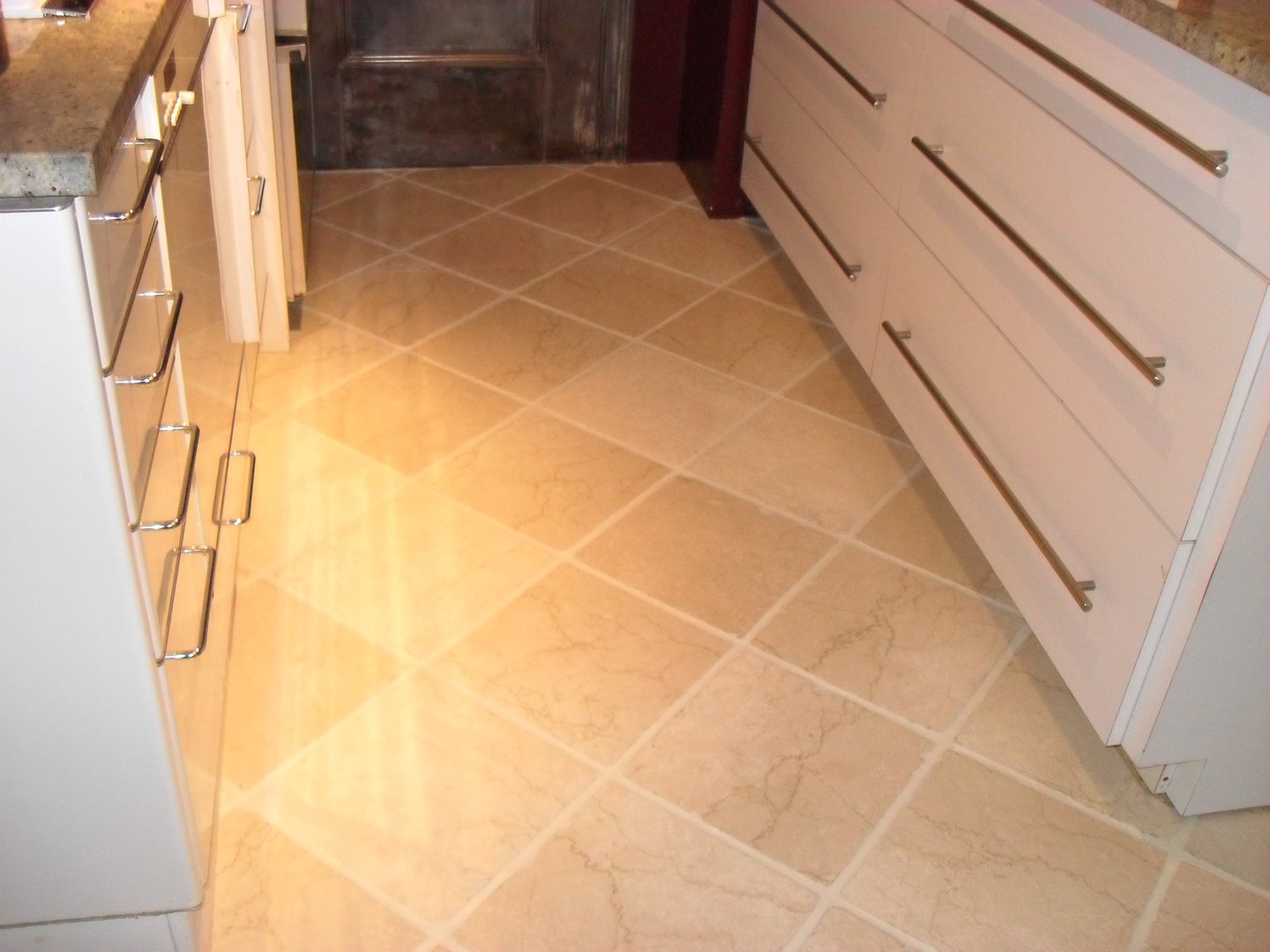 Floor tile after grout restoration