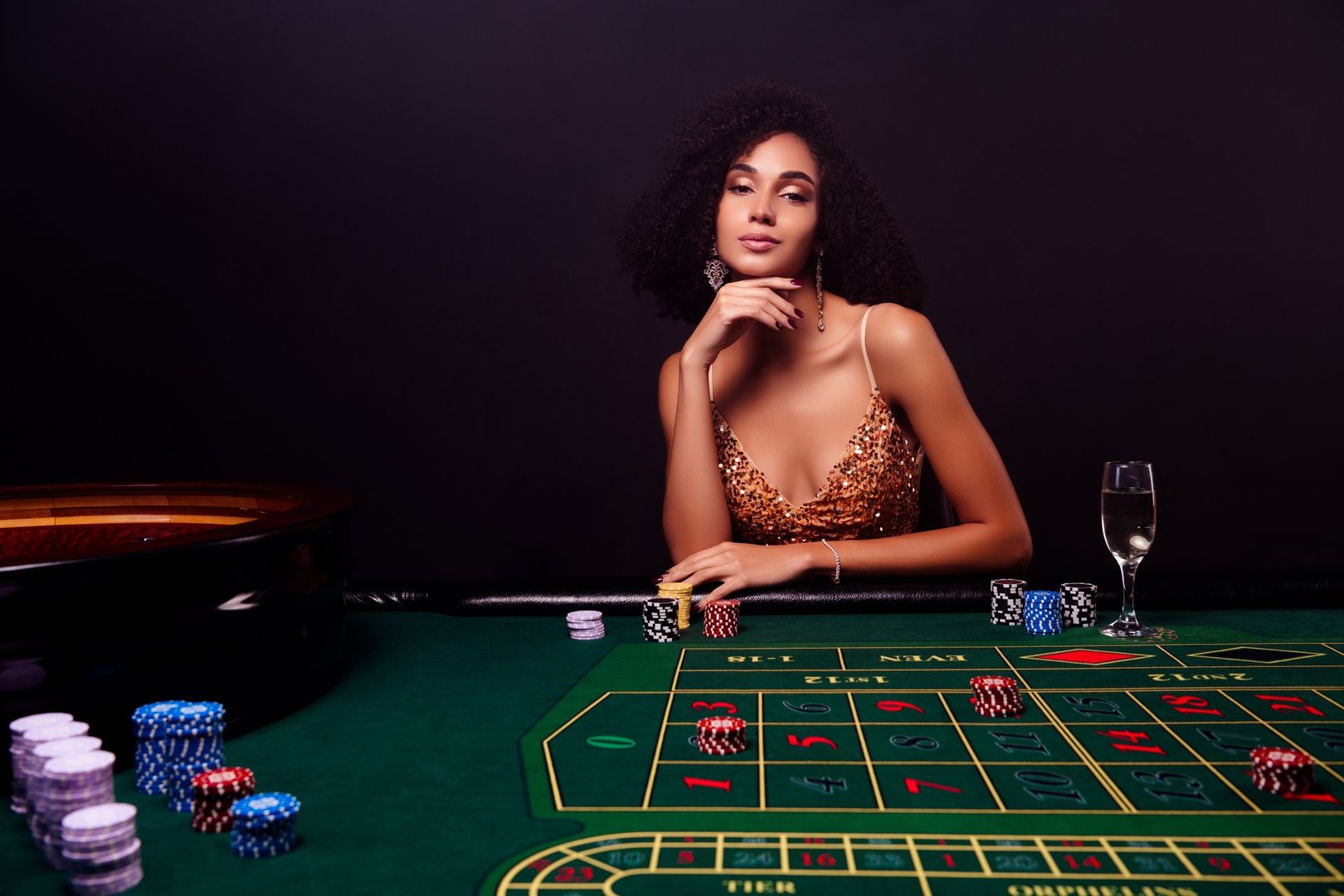 Photo of stunning lucky tempting girl dealer playing in casino private party night in las vegas on dark background.