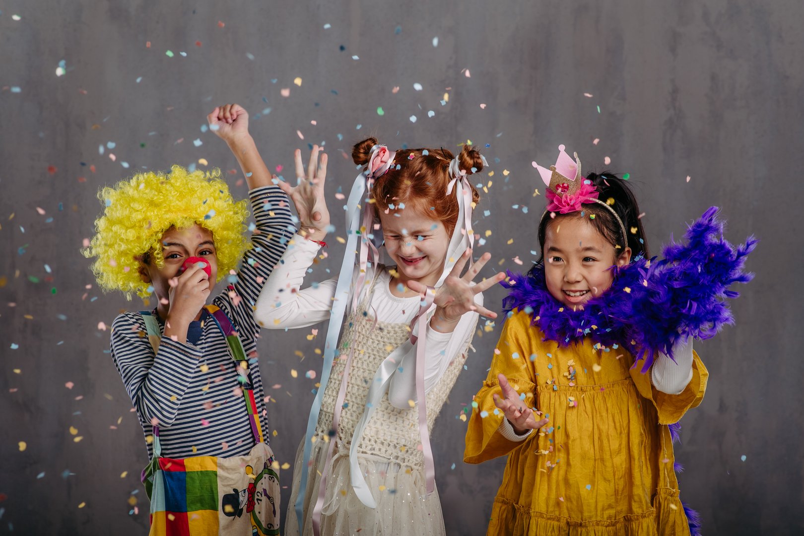 Portrait of three children in funny costumes