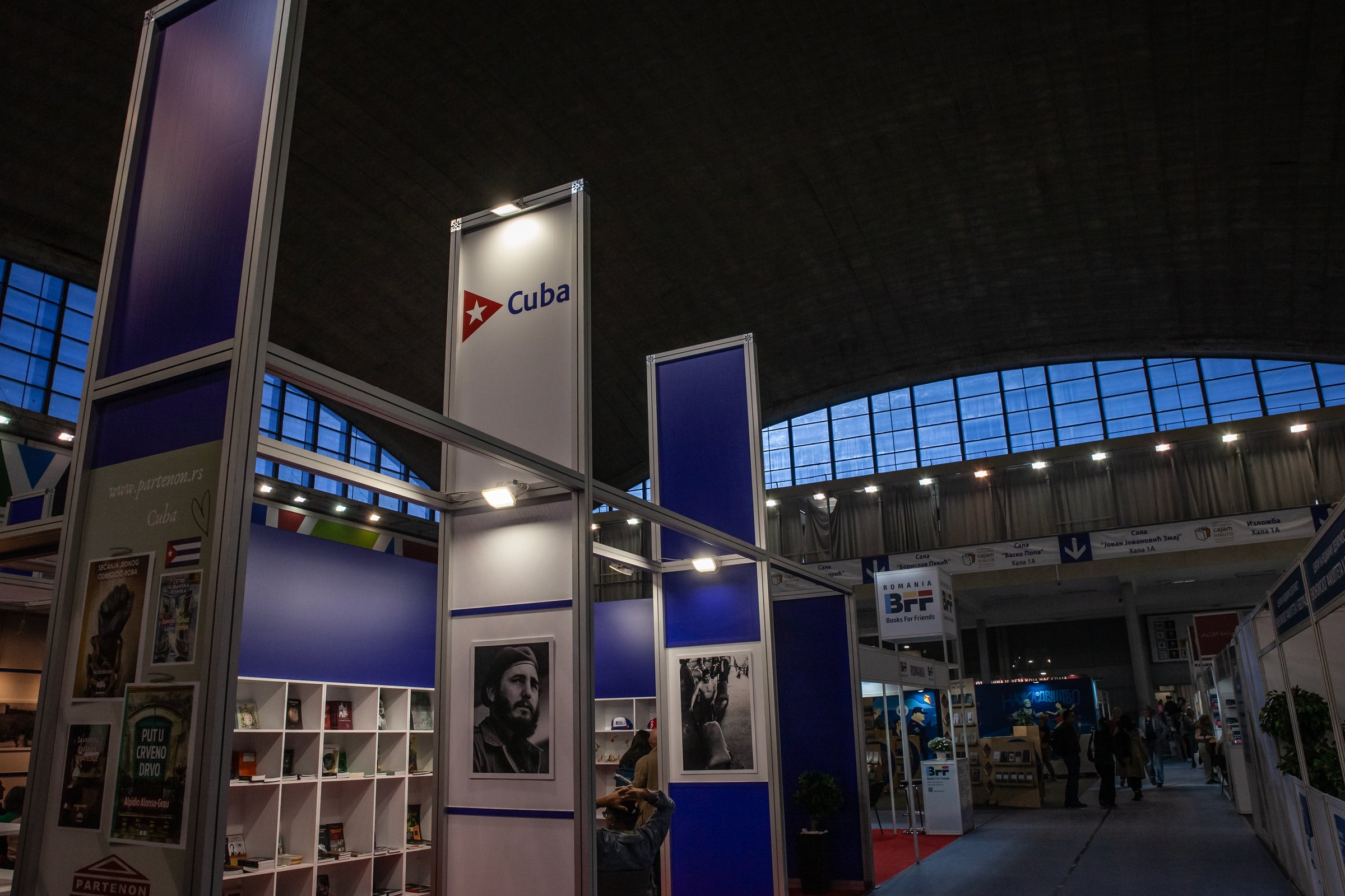 Cuba's wordmark and tourism booth in Serbia, showcasing a cultural and travel promotion campaign. The display emphasizes Cuban tourism and its efforts to attract international visitors.